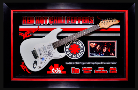 Guitarra autografiada por Red Hot Chilli Peppers